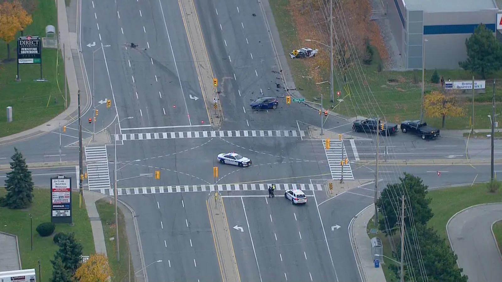 Brampton collision scene, emergency services, road closures.